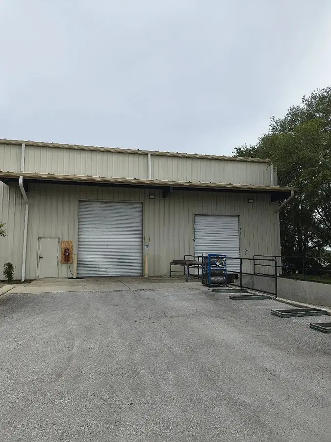 Warehouse building with gutters above the loading doors