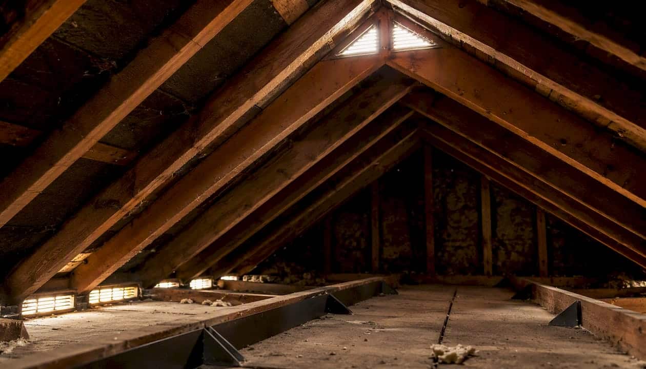 Attic interior showing soffit and ridge vents