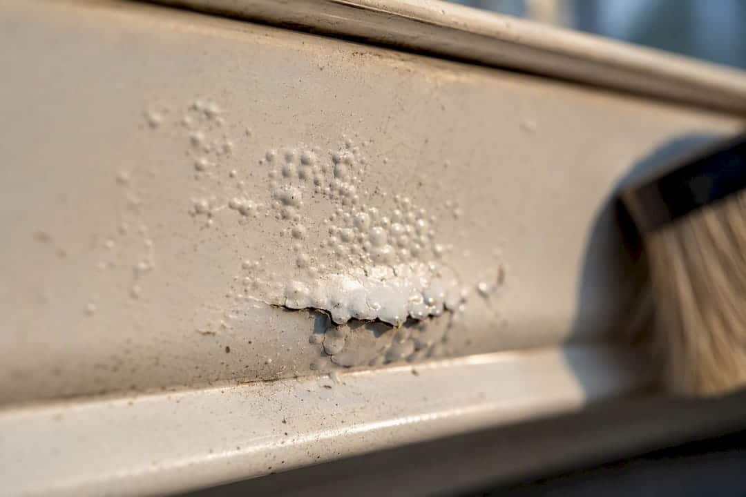 Bubbled and lifted paint on gutter finish